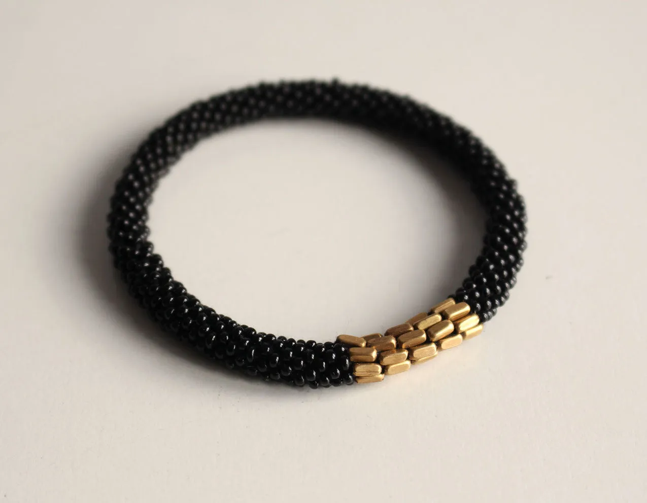 Stylish Golden Metal Crocheted Beads Roll On Bracelet